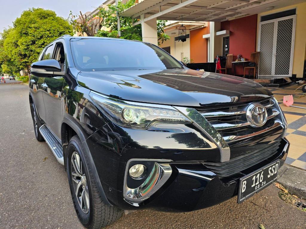 Toyota Fortuner VRZ Matic Tahun 2016 warna Hitam metalik kondisi Mulus Terawat DI JAMIN BAGUS